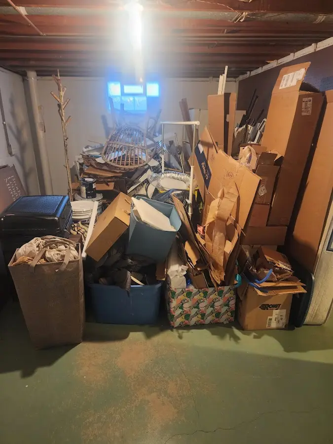 Roll-off dumpster container at job site for 8 Yard Dumpster Rental in Deltona